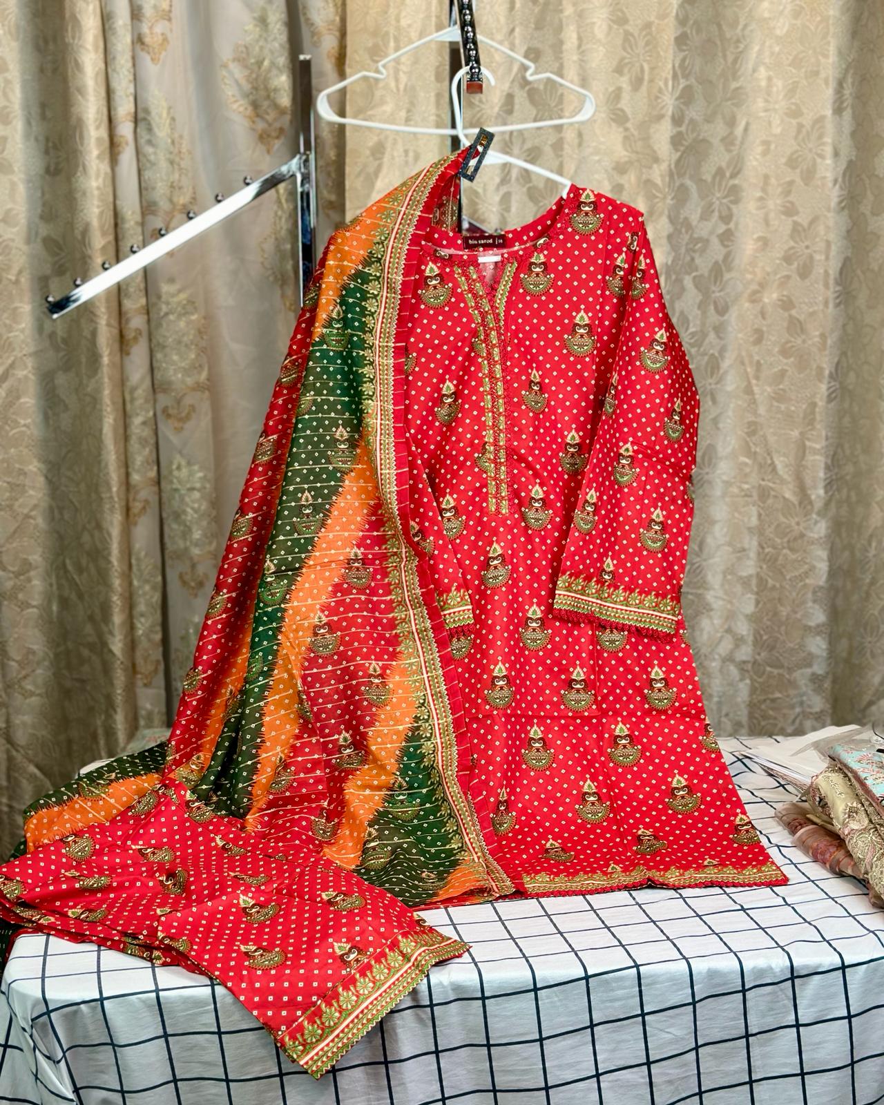 3 Piece Printed Red Color Lawn Stitched Suit with Printed Dupatta and Printed Trouser.