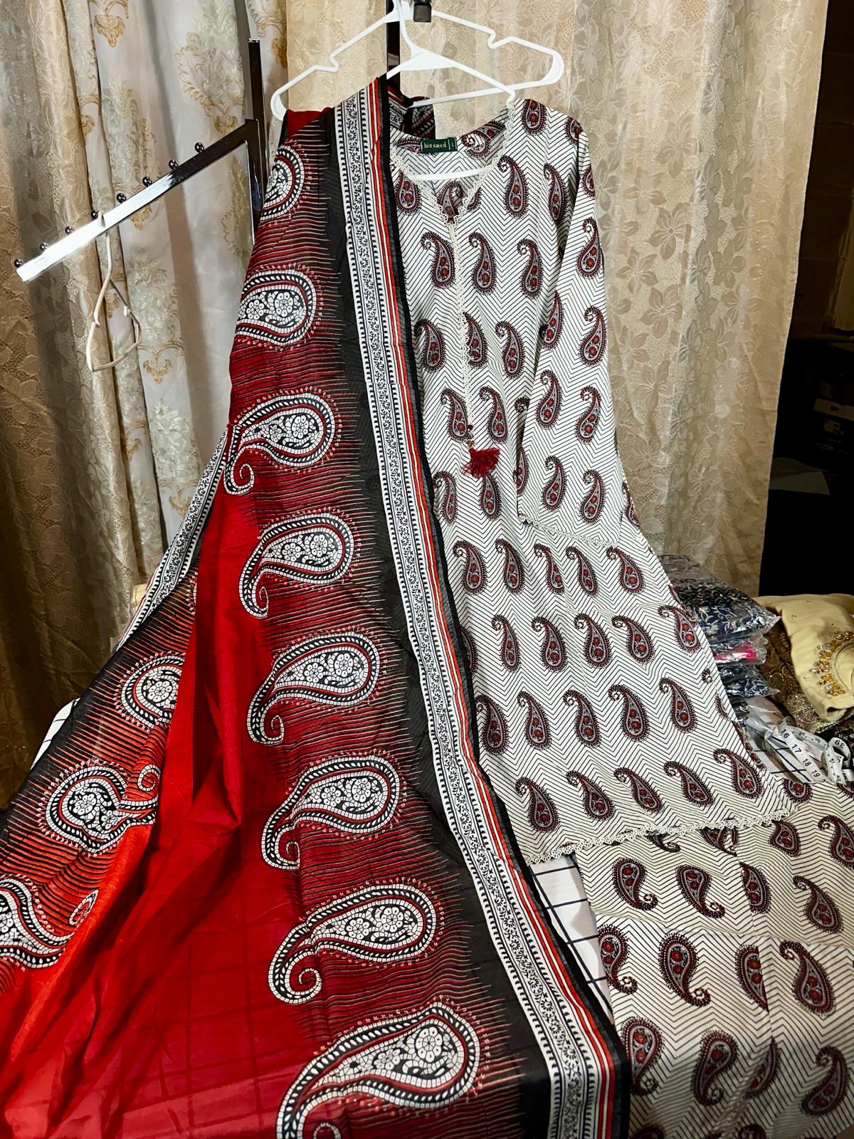 3 Piece Printed Ivory & Red Color Lawn Stitched Suit with Printed Dupatta and Printed Trouser.