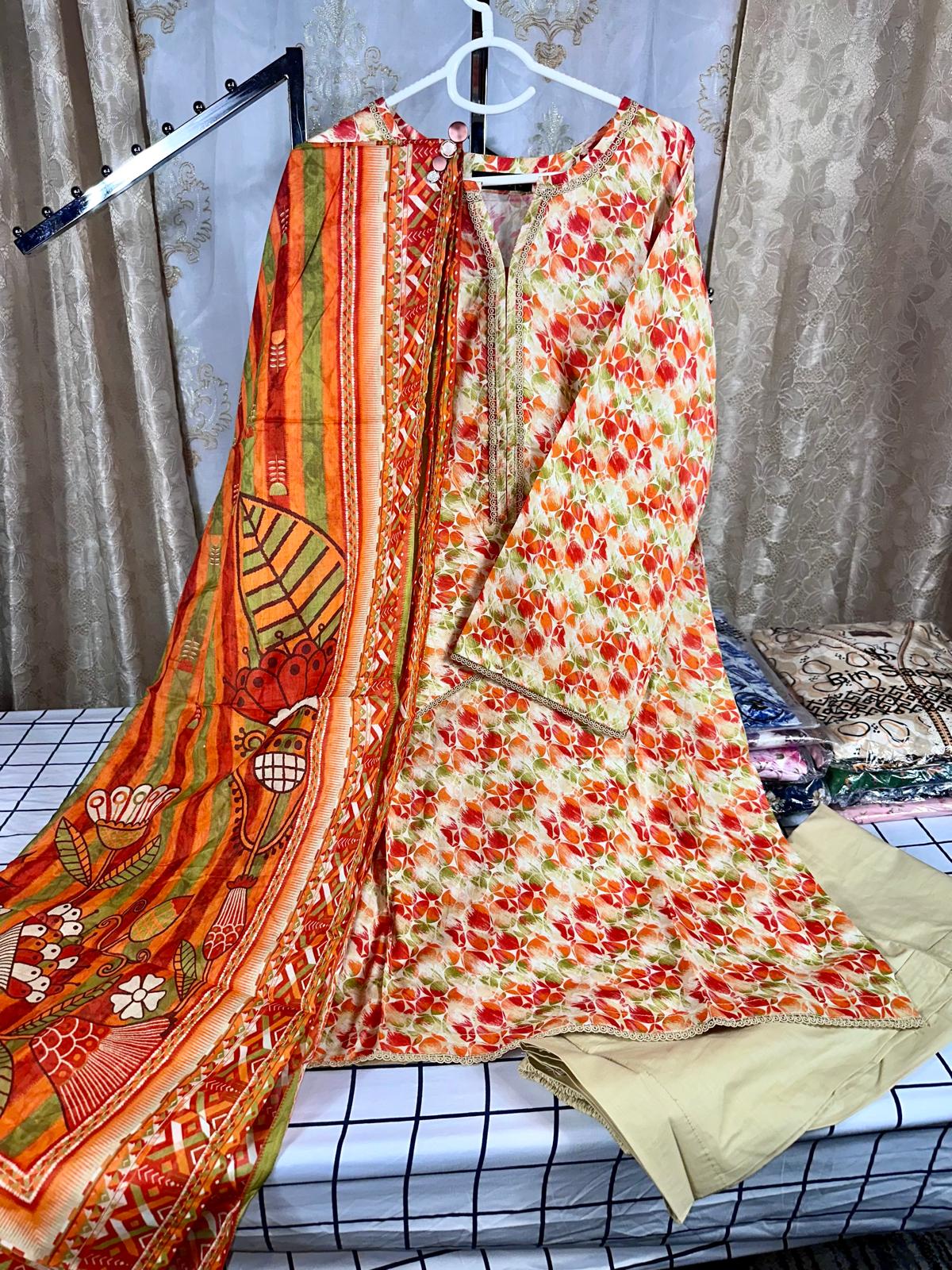 3 Piece Printed Multi Color Lawn Stitched Suit with Printed Lawn Dupatta and Plain Trouser.