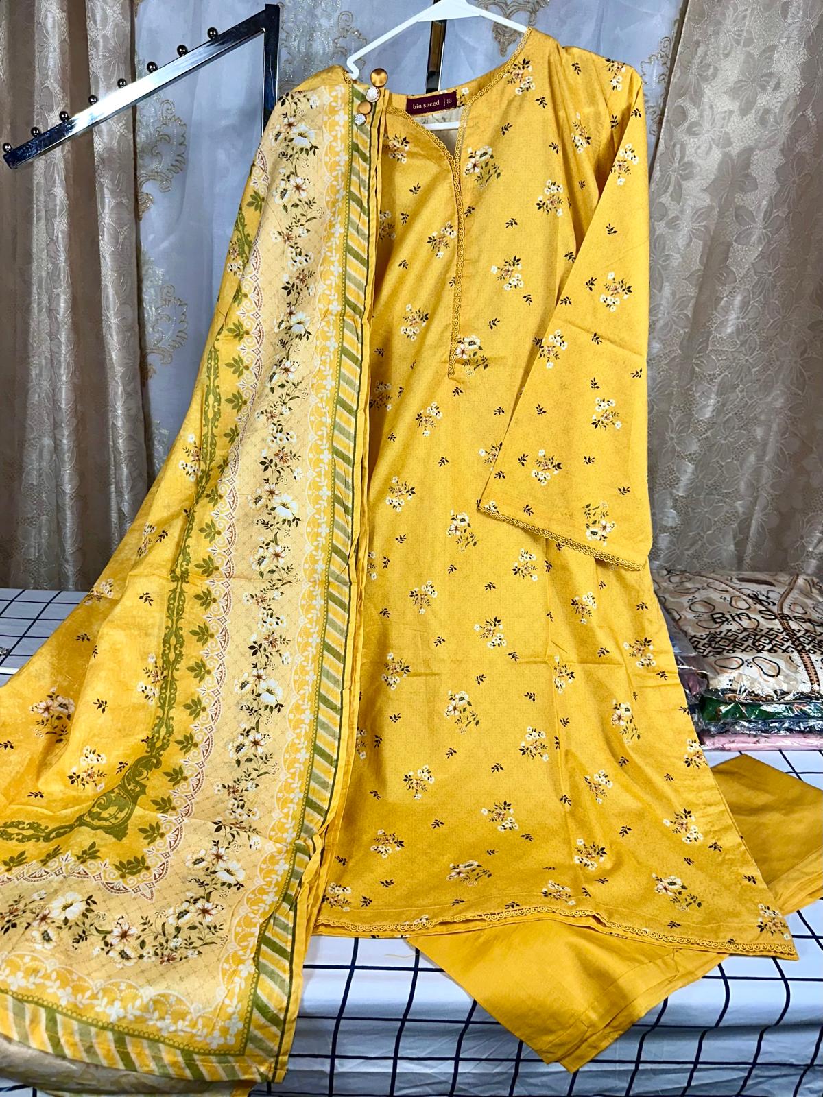 3 Piece Printed Yellow Color Lawn Stitched Suit with Printed Dupatta and Plain Trouser.